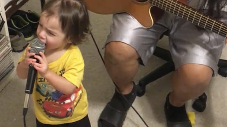 Netizens are Blown Away by This Toddler Singing Into a Microphone